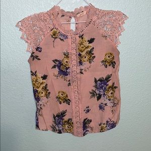 women’s pink flowered blouse